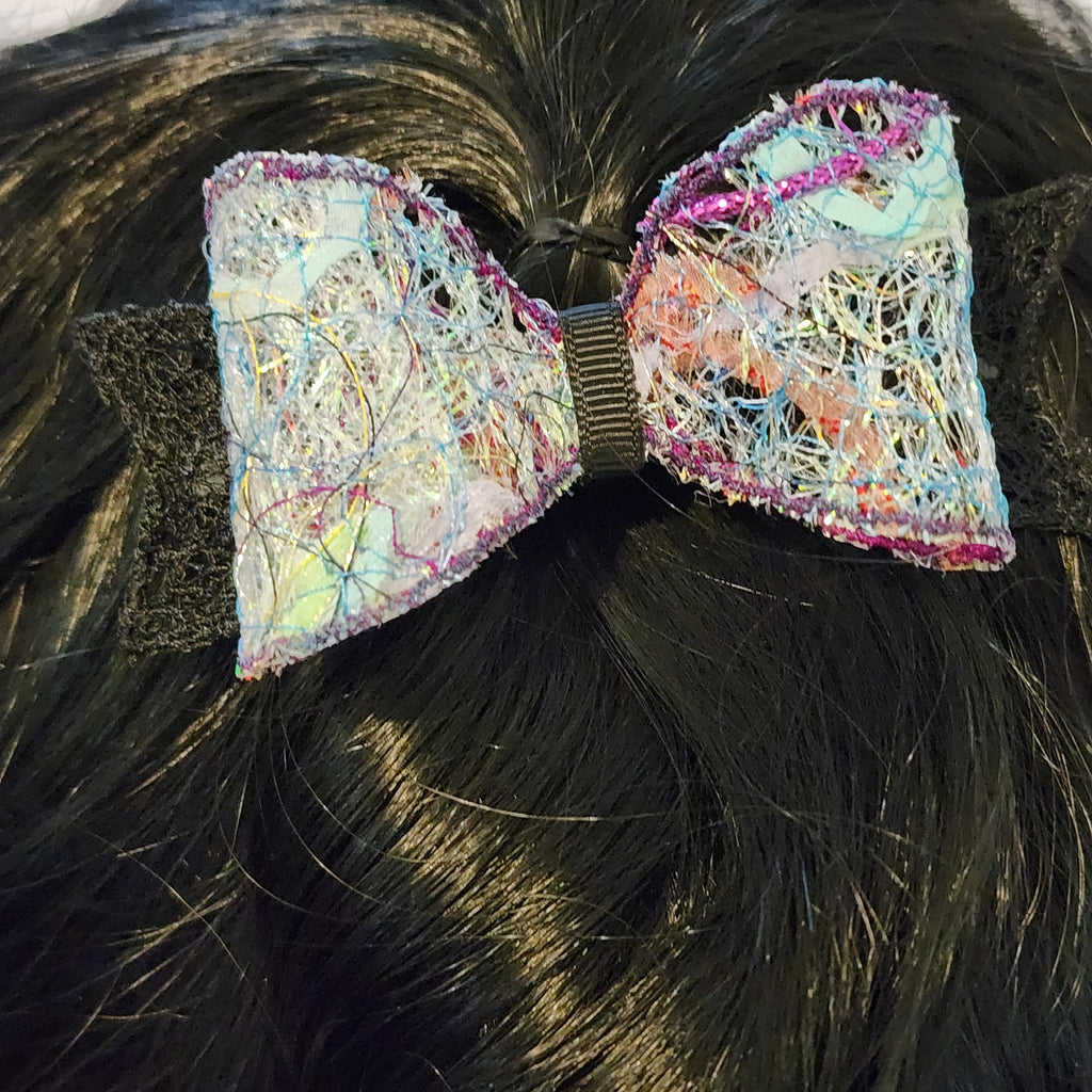 B-BLK-1, Bow Barrette. Fabric made by Free Motion Embroidery. Lacy and Unique