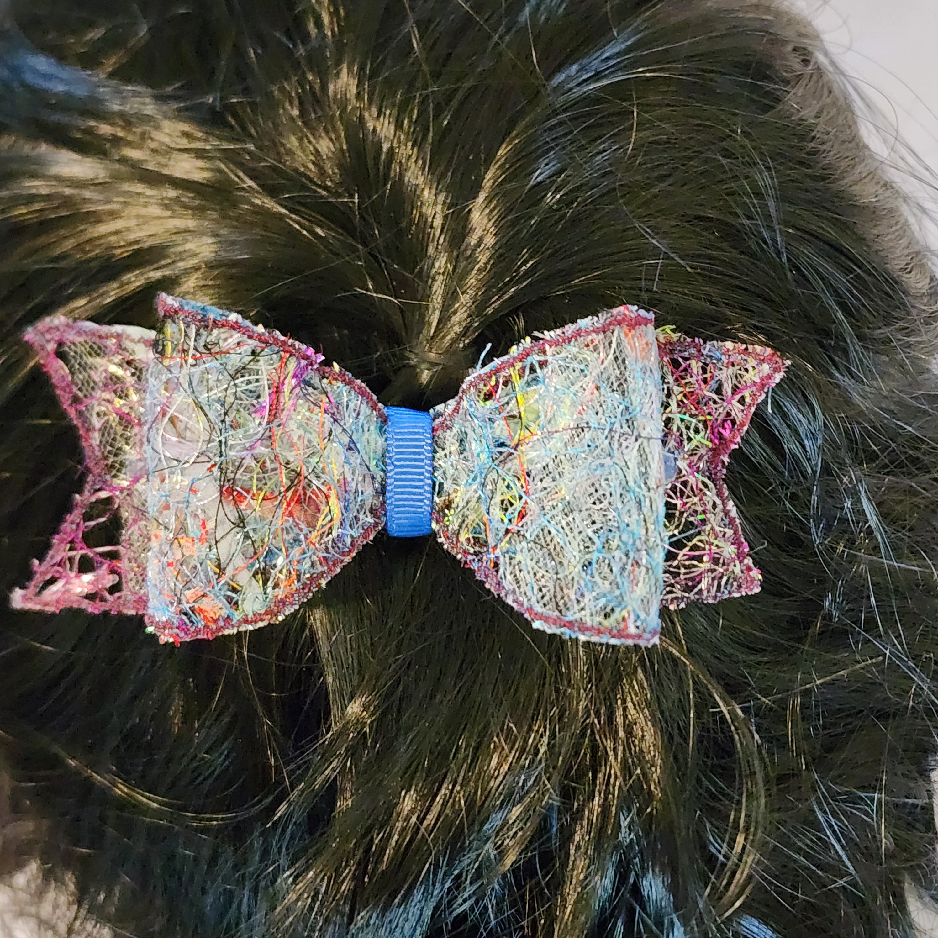 B-BLU-3, Bow Barrette. Fabric made by Free Motion Embroidery. Lacy and Unique