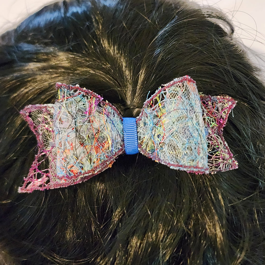 B-BLU-3, Bow Barrette. Fabric made by Free Motion Embroidery. Lacy and Unique