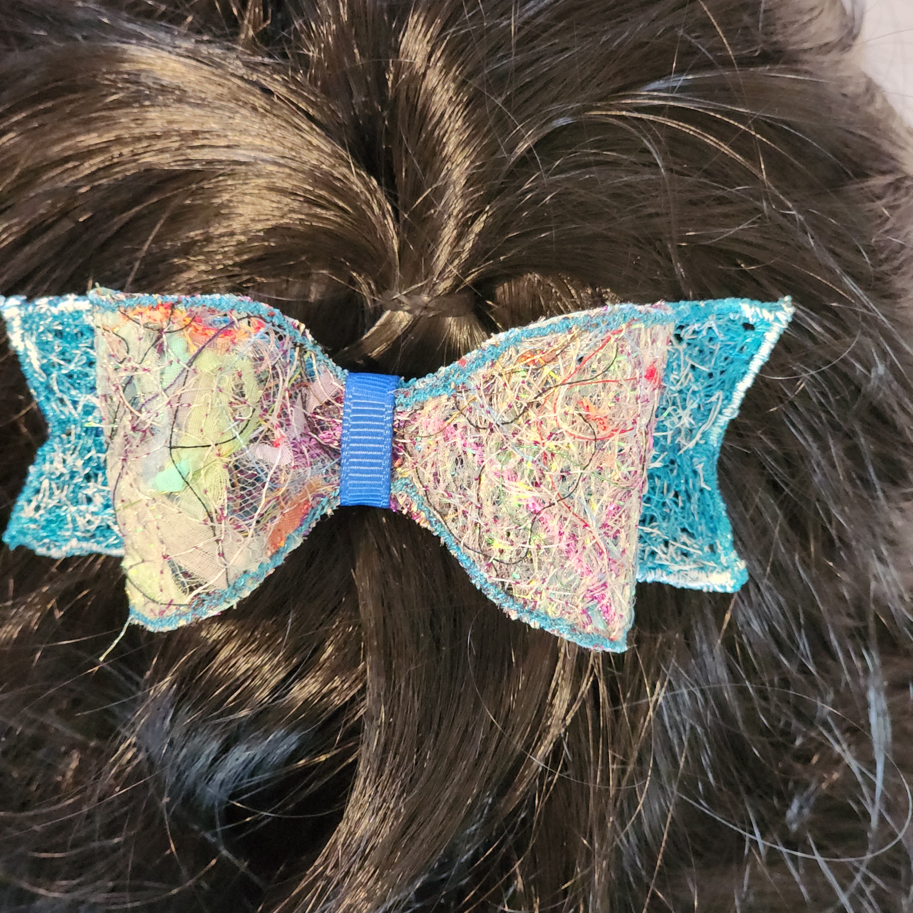 B-BLU-4, Bow Barrette. Fabric made by Free Motion Embroidery. Lacy and Unique