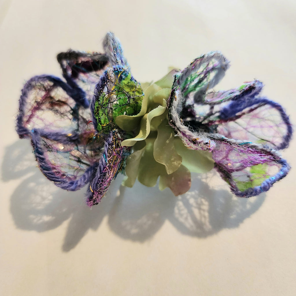 B-FL-1  Abstract Flower Barrette. Fabric made by Free Motion Embroidery. Lacy and Unique