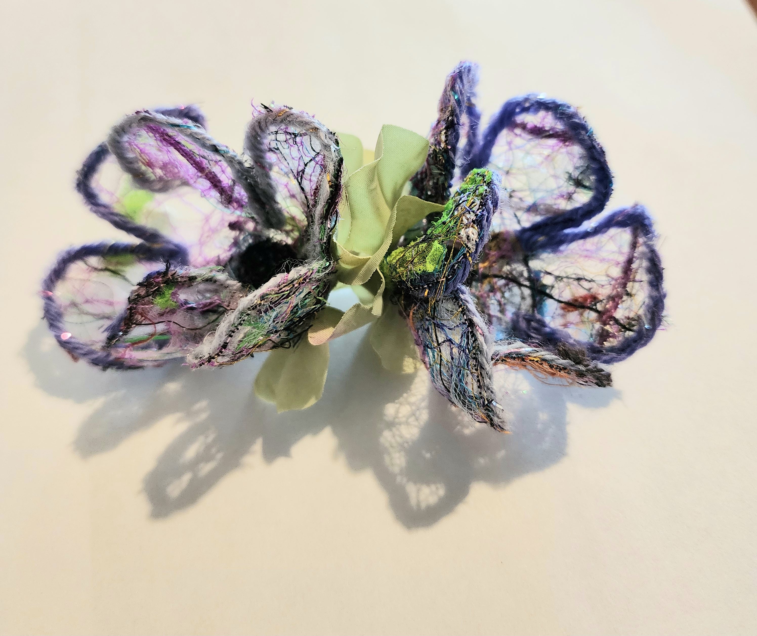 B-FL-1  Abstract Flower Barrette. Fabric made by Free Motion Embroidery. Lacy and Unique