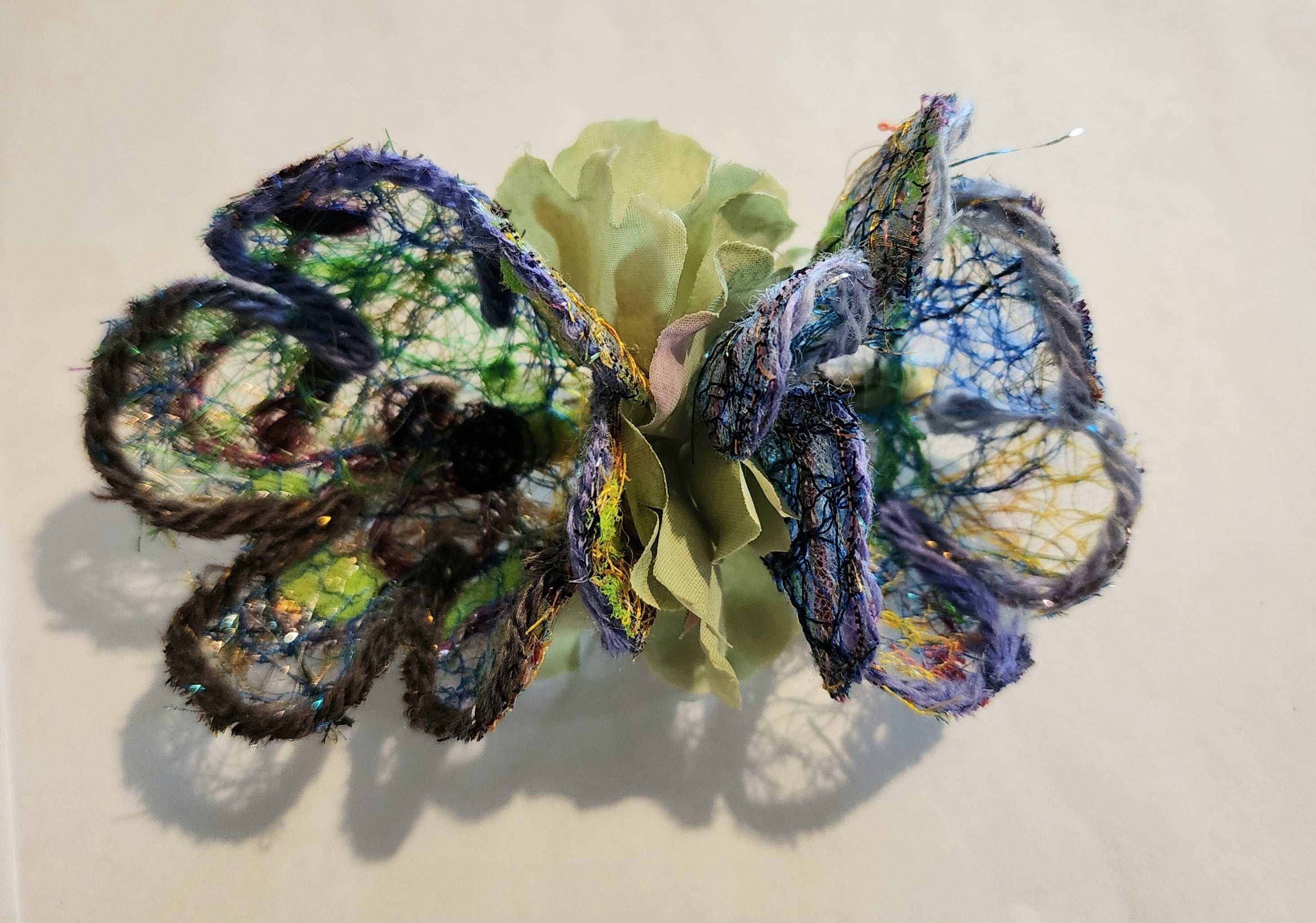 B-FL-4  Abstract Flower Barrette. Fabric made by Free Motion Embroidery. Lacy and Unique