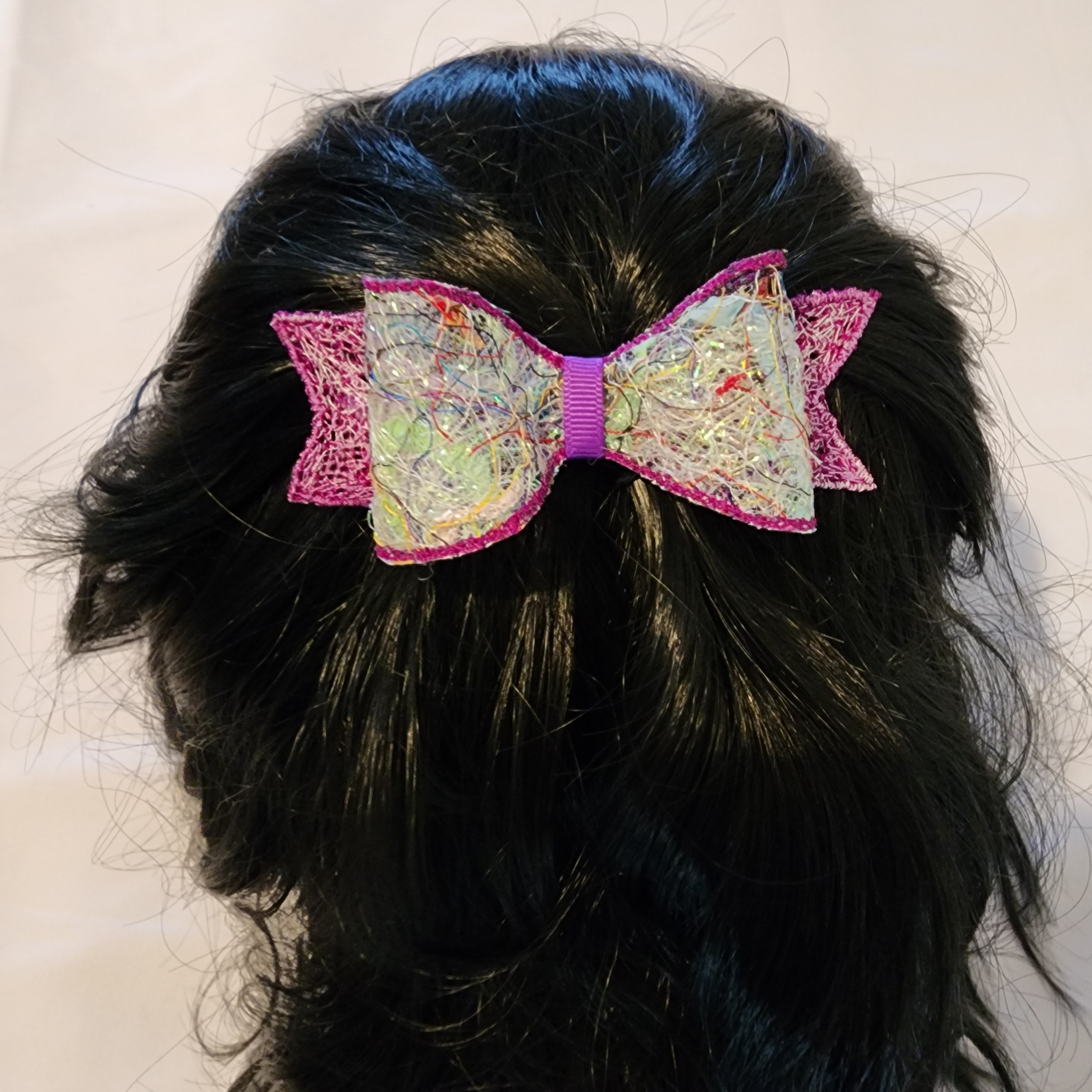 B-PRP-1, Bow Barrette. Fabric made by Free Motion Embroidery. Lacy and Unique