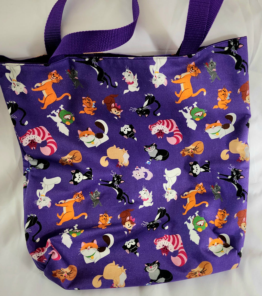 Purple bag with cartoon cat pattern on a white background