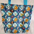 Tote bag with cartoon dog pattern on a white background