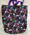 Tote bag with colorful character pattern on a white background