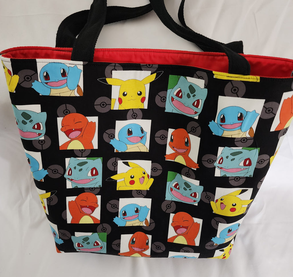 Tote bag with cartoon character pattern on a white background