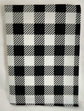 Black and white checkered book cover on a white background
