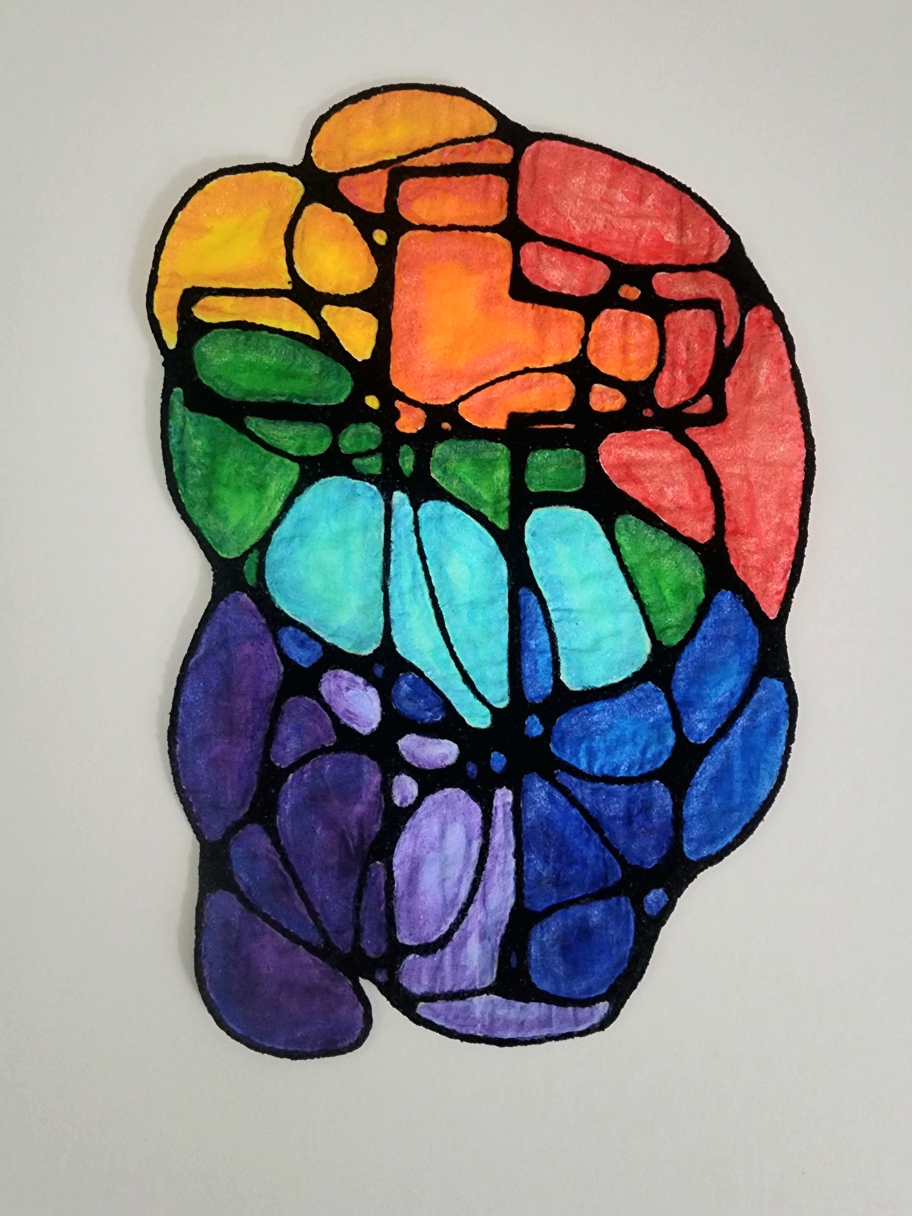 Colorful stained glass-style depiction of a cross on a white background