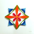 Colorful geometric star-shaped object on a white background