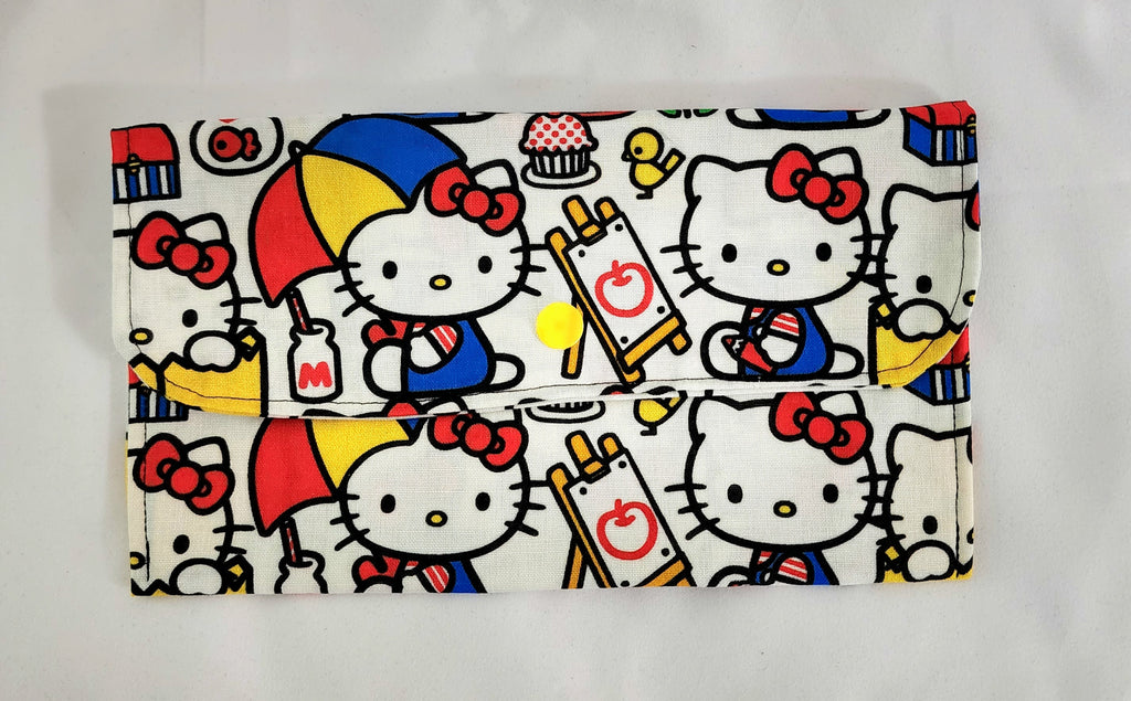 Hello Kitty-themed pouch with colorful design on a white background