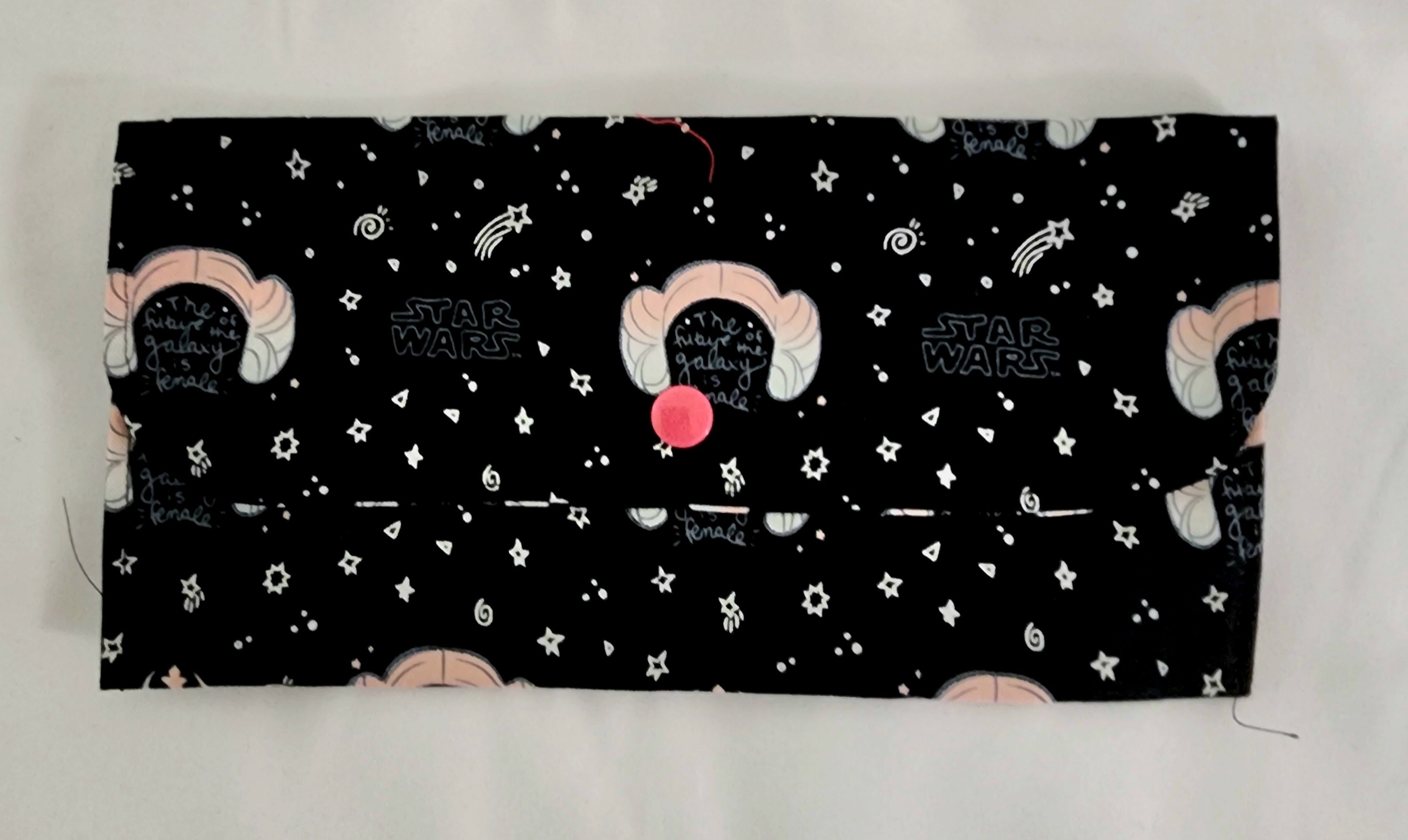 Princess Leia 'Star Wars' pattern featuring characters and text on a black background