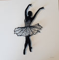 Black thread sculpture of a ballerina on a white background