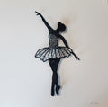 Silhouette of a ballerina dancer on a white background