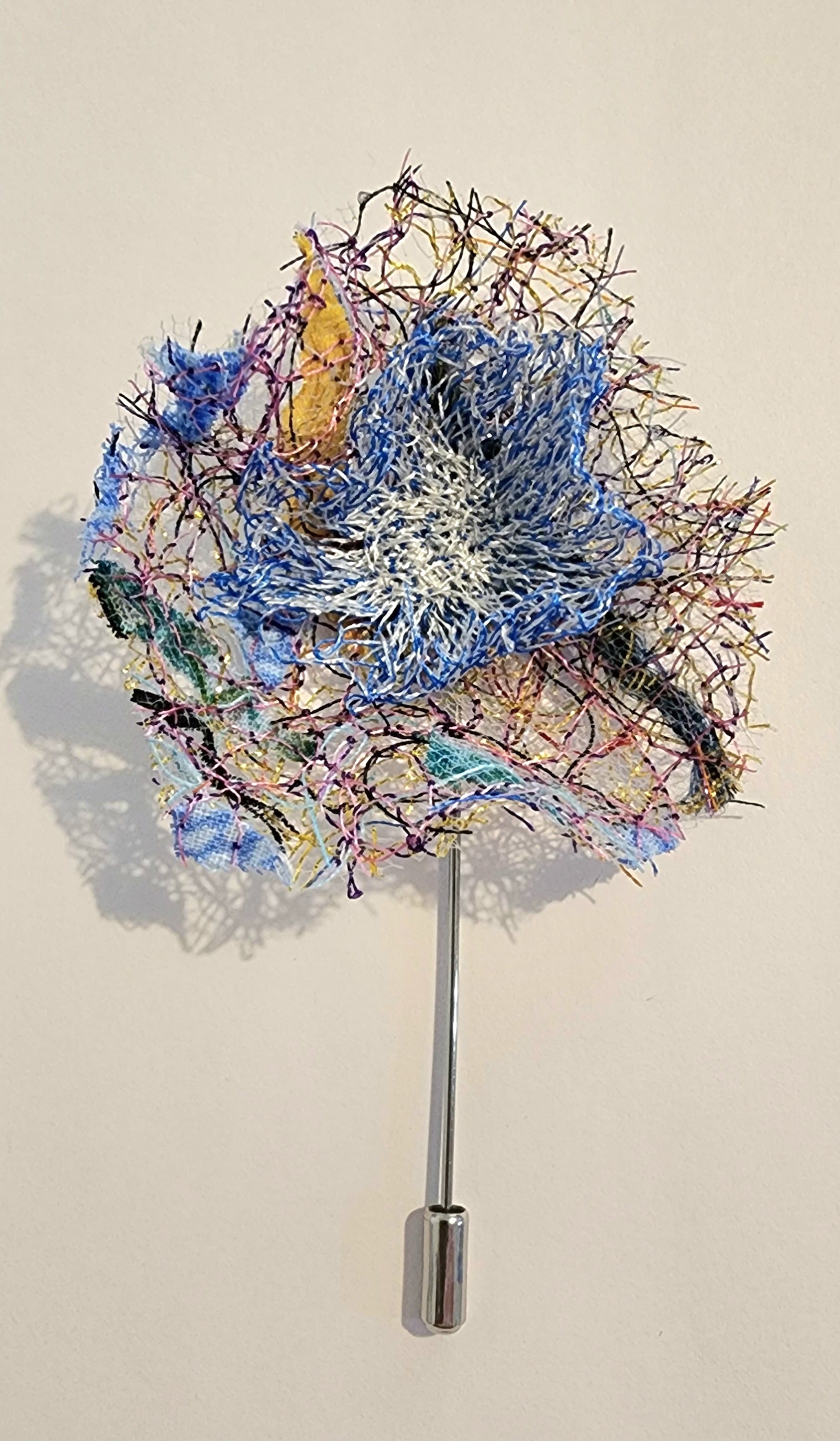 SP-1 Abstract Flower Stick Pin / Lapel Pin. Fabric made by Free Motion Embroidery. Lacy and Unique