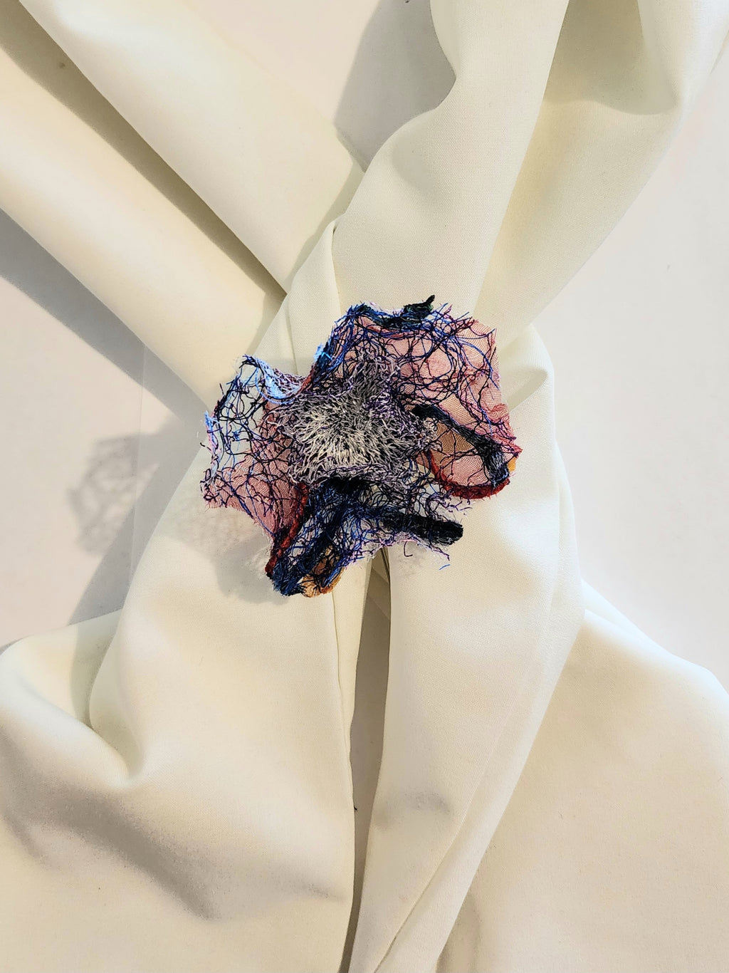 SP-14 Abstract Flower Stick Pin / Lapel Pin. Fabric made by Free Motion Embroidery. Lacy and Unique