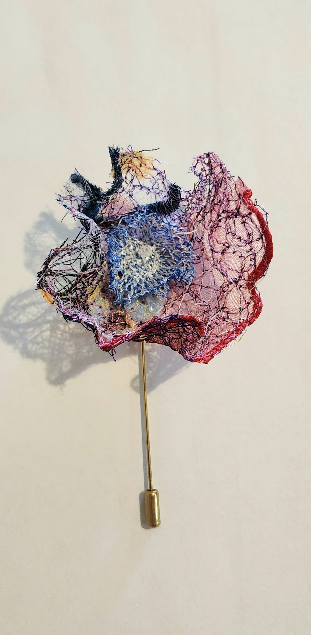SP-3 Abstract Flower Stick Pin / Lapel Pin. Fabric made by Free Motion Embroidery. Lacy and Unique)