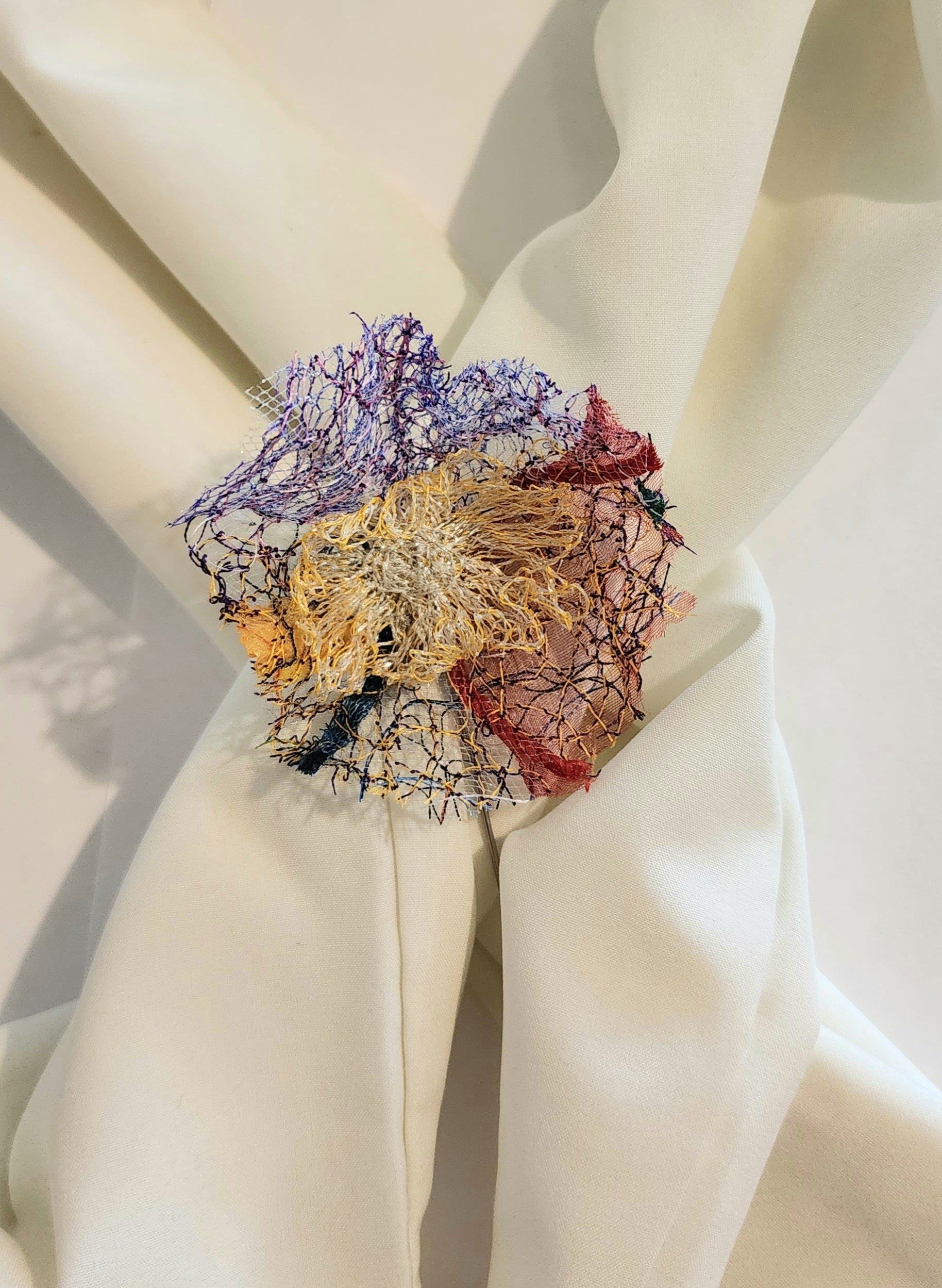 SP-5 Abstract Flower Stick Pin / Lapel Pin. Fabric made by Free Motion Embroidery. Lacy and Unique)