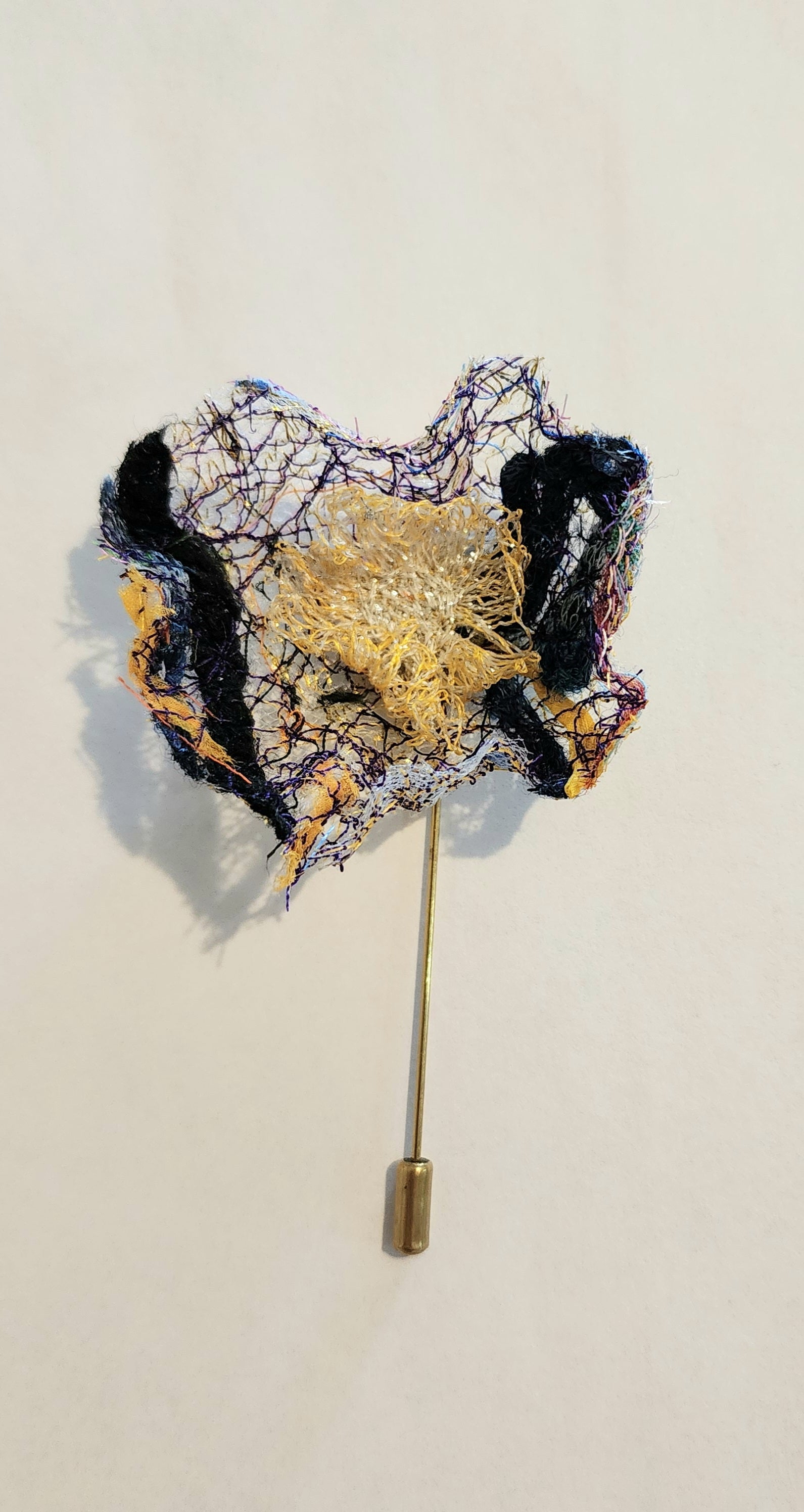 SP-6 Abstract Flower Stick Pin / Lapel Pin. Fabric made by Free Motion Embroidery. Lacy and Unique)