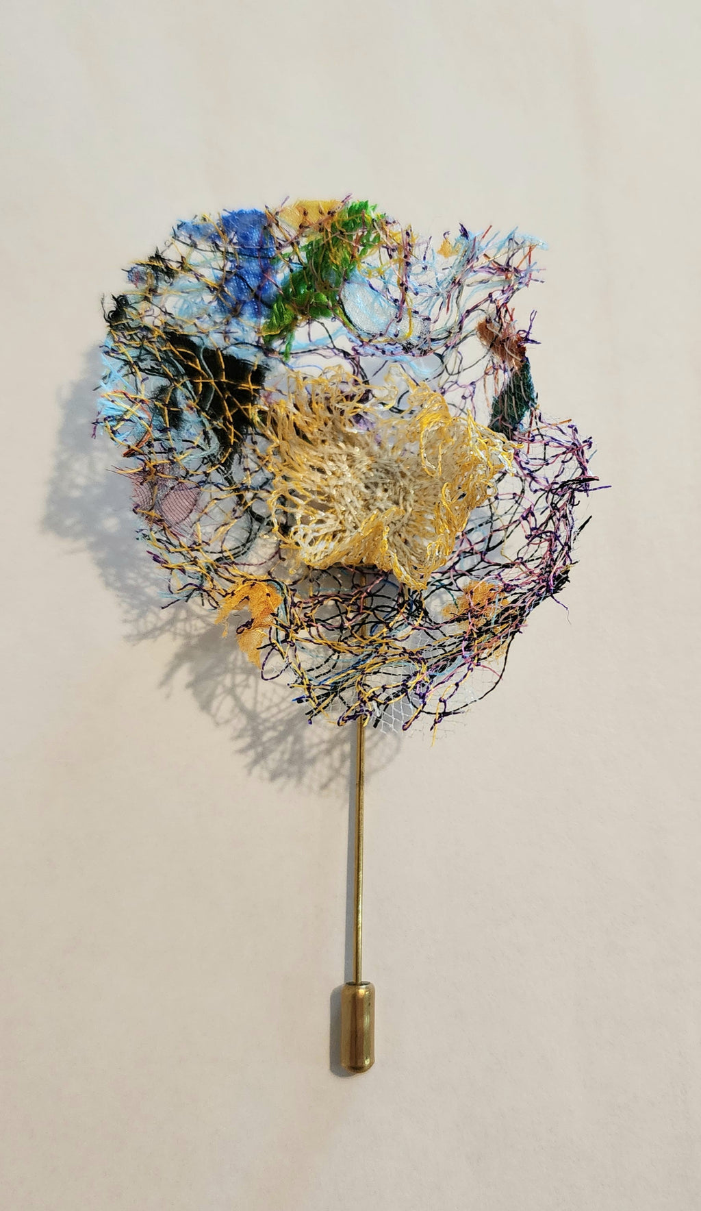 SP-7 Abstract Flower Stick Pin / Lapel Pin. Fabric made by Free Motion Embroidery. Lacy and Unique