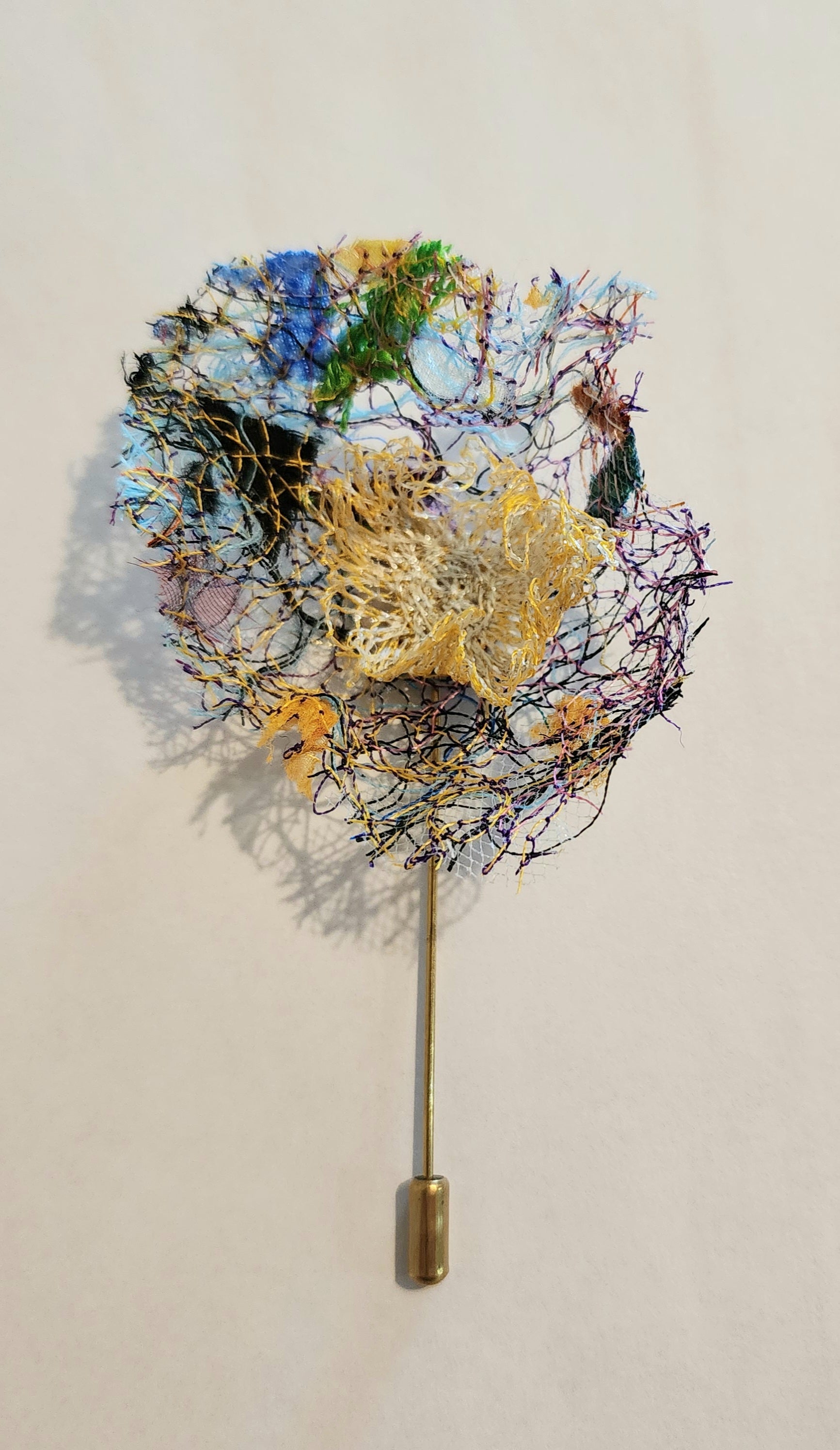 SP-7 Abstract Flower Stick Pin / Lapel Pin. Fabric made by Free Motion Embroidery. Lacy and Unique