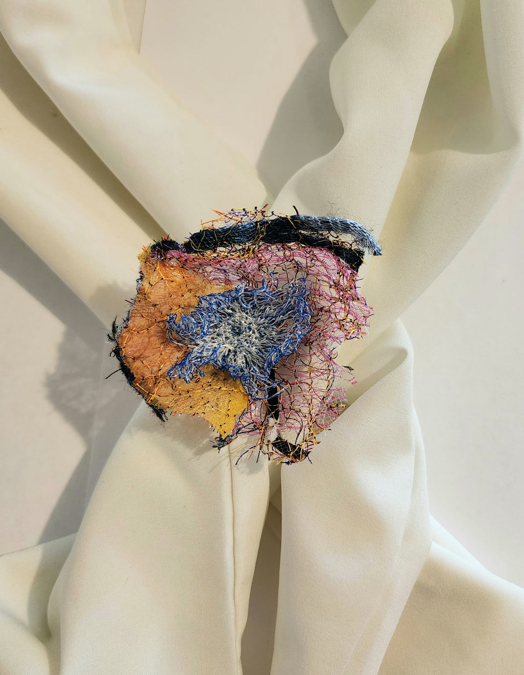 SP-8 Abstract Flower Stick Pin / Lapel Pin. Fabric made by Free Motion Embroidery. Lacy and Unique
