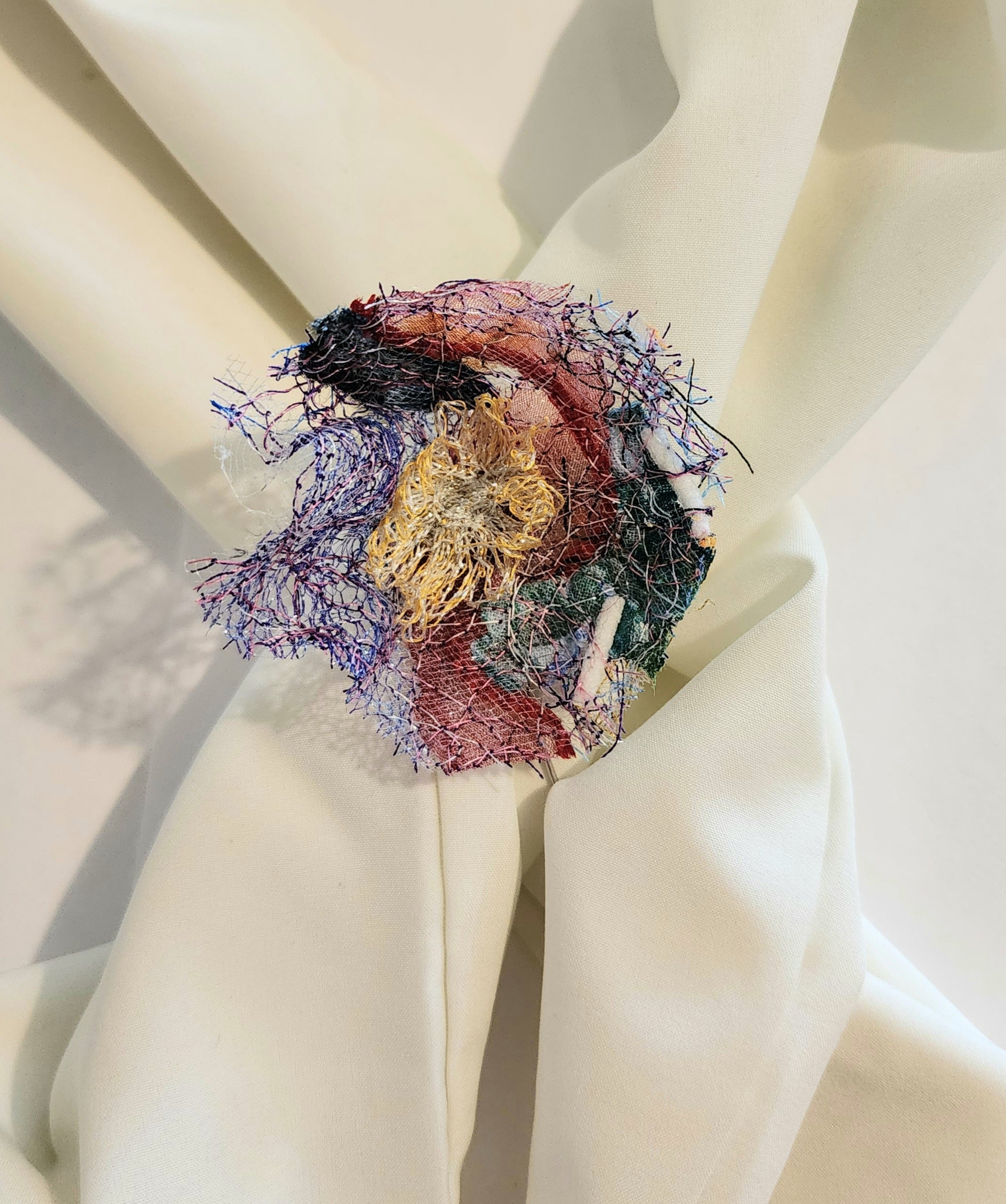 SP-9 Abstract Flower Stick Pin / Lapel Pin. Fabric made by Free Motion Embroidery. Lacy and Unique